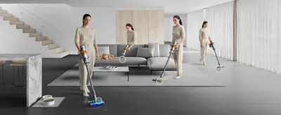 Shows the vacuum cleaning different messes around a real living room, so shoppers can picture it working across their home.