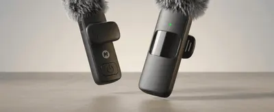 Shows the sleek, compact design of the two mic units in a clean studio scene to build visual appeal.