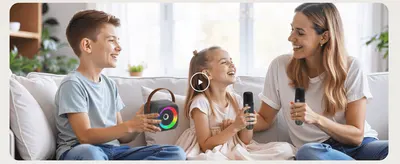 Shows a family enjoying karaoke together to help shoppers picture using the product at home.