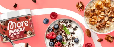 Shows the product tin alongside an appetizing dessert scene to build an aspirational, lifestyle association with the brand.