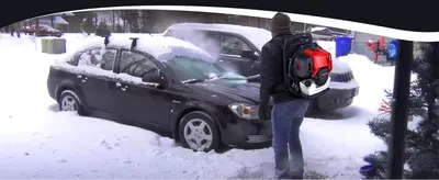 Demonstrates the product's versatility for winter applications, specifically clearing snow from vehicles in cold weather conditions.