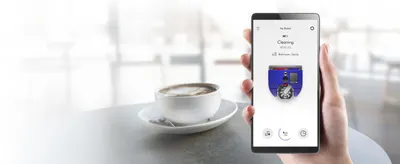 Showcases the mobile app interface and remote control capability, demonstrating convenience and ease of monitoring the robot vacuum from anywhere.