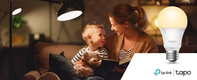 Shows the smart bulb in a warm home setting to help shoppers picture cozy, comfortable lighting for family moments.