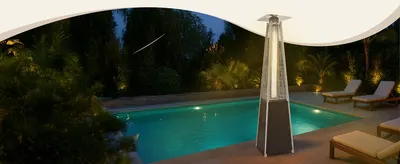 Shows the heater beside a pool at dusk to help shoppers envision warm relaxing evenings in a backyard resort setting.