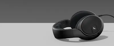 Shows the open-back headphones alone on a clean studio backdrop so shoppers can judge the design and build without distractions.
