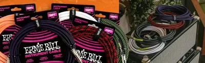 Shows the full range of instrument cables in several colors to reinforce the brand's product line and variety.