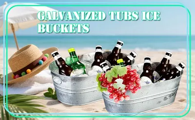 Shows the galvanized tubs filled with bottled drinks on a sunny beach to help shoppers envision using them for summer gatherings.