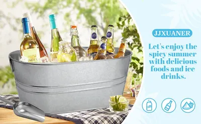 Shows the galvanized tub filled with drinks on an outdoor table to help shoppers picture it at summer gatherings.