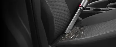 Shows the product being used in a vehicle interior to help shoppers envision versatile cleaning applications.