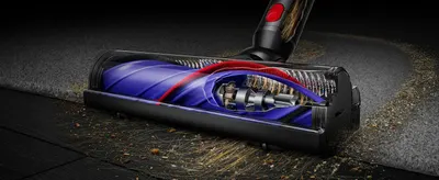 Reveals the internal engineering and components of the vacuum cleaner head to demonstrate quality construction and advanced technology to shoppers.
