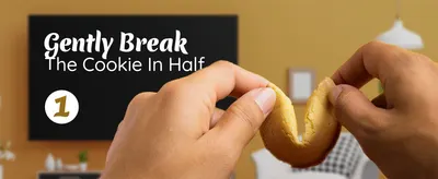 Demonstrates the first step in using the product, showing shoppers the proper way to open or prepare the fortune cookie.