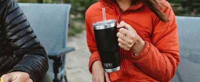 Demonstrates the product in use during outdoor leisure activities to help shoppers visualize real-world application.