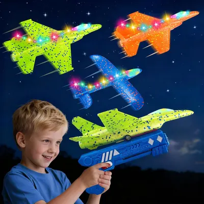 Showcase the vibrant, light-up toy planes and launcher included in the set Demonstrate the product in use by a child, highlighting its appeal and ease of use