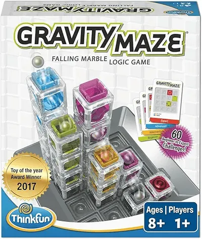 Showcase the full contents of the Gravity Maze game, including the colorful maze pieces and challenge cards Display all the individual components of the game, highlighting the variety of colorful…