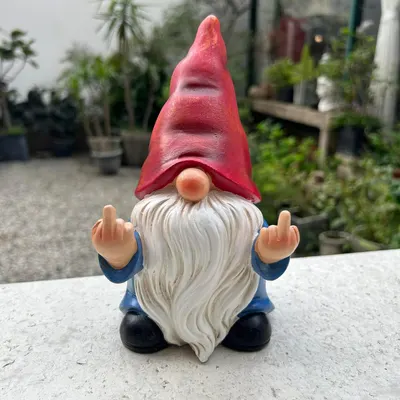 Showcases a quirky garden decoration to appeal to customers looking for unique outdoor accessories.
