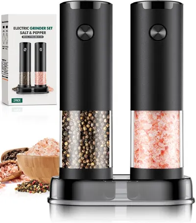 Showcases the product's design and functionality, highlighting the dual grinder set for salt and pepper. Displays the complete product set including packaging…