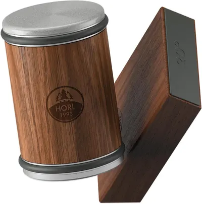 Showcases the premium materials and craftsmanship of the product, highlighting its wood grain texture and metal components. Displays the main product alongside an additional component, showing the…
