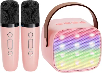Showcases the complete karaoke set including two microphones and a portable speaker with colorful lights. Highlights all components included in the set, emphasizing the dual microphone setup and the…