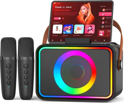 Showcases the complete karaoke system with speaker, microphones, and tablet holder for an all-in-one entertainment solution. Displays all components of the karaoke system to show buyers exactly what…