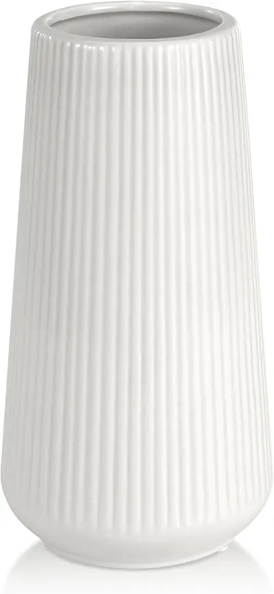 Showcases the clean, modern design of the vase with its ribbed texture against a white background.