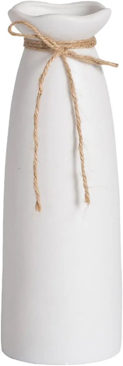 Showcases the clean, simple design of the white ceramic vase with rustic twine accent.