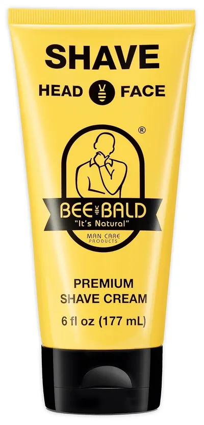 Showcases the product packaging and clearly communicates its purpose as a shaving cream for both head and face.