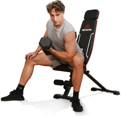 Shows a model using the weight bench and dumbbell to demonstrate proper form and the product's functionality for strength training.