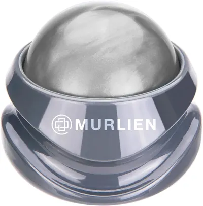 Showcases the unique spherical design of the massage tool, highlighting its sleek and modern appearance.