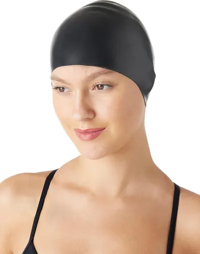 Demonstrates how the swimming cap fits and looks when worn, showcasing its sleek design and proper coverage.
