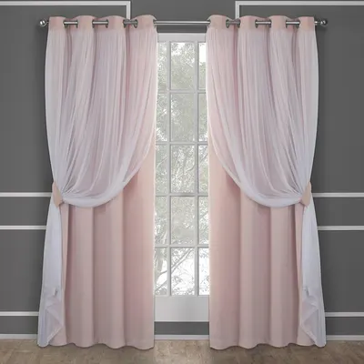 Showcases the curtains' layered design and light-filtering properties in a realistic room setting.