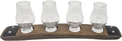 Showcases a complete whiskey tasting set with glasses and wooden holder, highlighting the product's design and functionality.