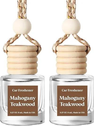 Showcases the product design and labeling of car freshener bottles to inform customers about the specific scent and appearance.