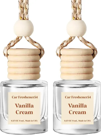 Showcases the product design and packaging of car freshener bottles.