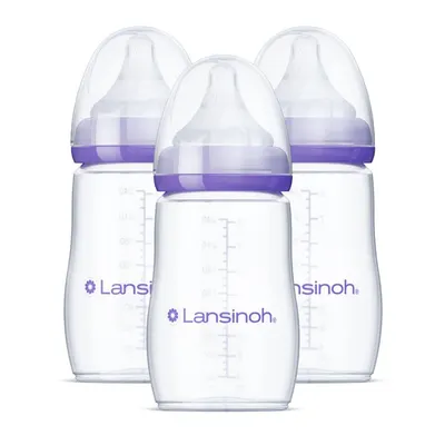 Showcases the product clearly, highlighting the set of three Lansinoh baby bottles with purple accents. Displays multiple identical bottles to indicate that this is a multi-pack offering, giving…