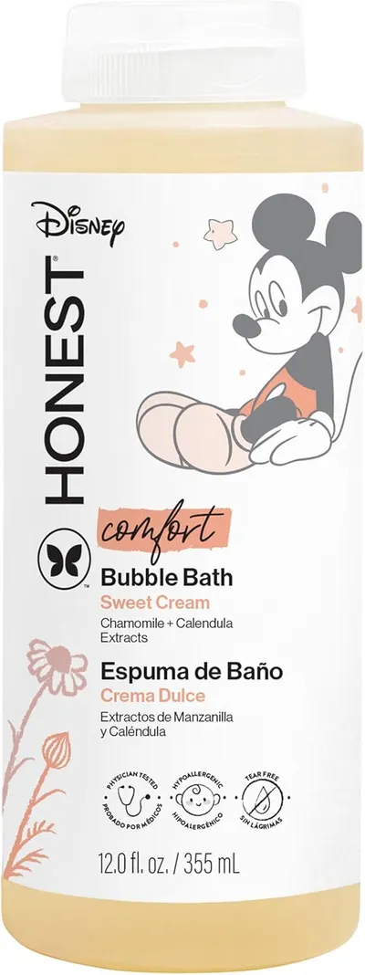Showcases the product's packaging to highlight the Disney branding and gentle formula for children.