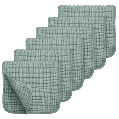 Showcases a set of identical textured cloths or towels, emphasizing the product's quantity and unique surface pattern.