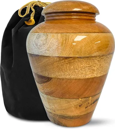 Showcases the high-quality wooden construction and elegant design of the urn to appeal to those seeking a dignified memorial vessel. Demonstrates that the urn comes with a protective velvet bag,…