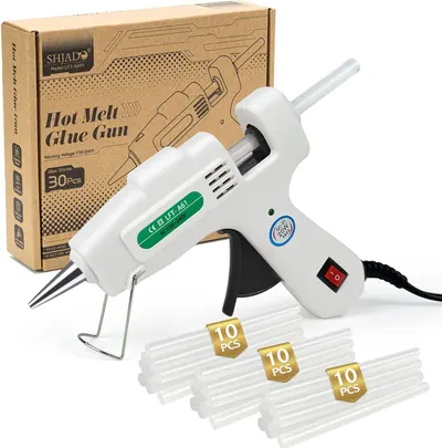 Shows the complete product package including the glue gun and included glue sticks to inform buyers of exactly what they will receive. Displays the product alongside its retail packaging to…