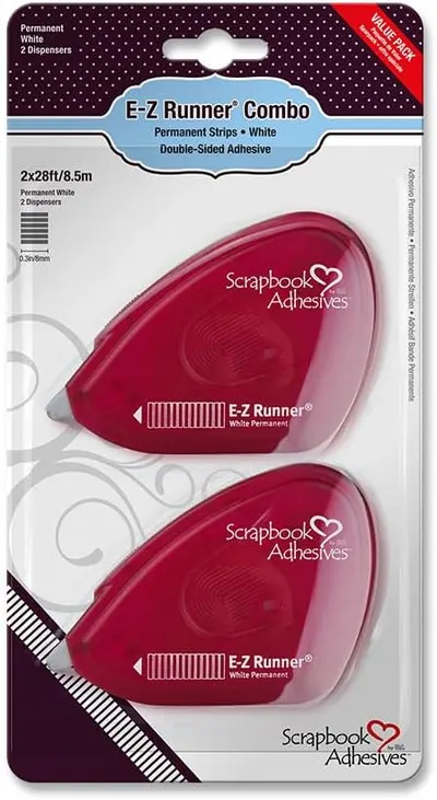Shows the complete set of adhesive dispensers included in the package, highlighting the value proposition of getting two items. Displays the product in its retail packaging to communicate brand…