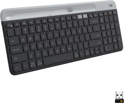 Shows the complete keyboard product with all keys visible to demonstrate its full functionality and layout. Includes the wireless USB dongle to highlight that this is a wireless keyboard with easy…