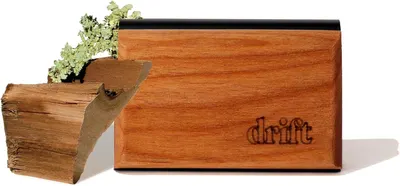 Showcases the sleek wooden design and premium materials of the product to appeal to customers looking for high-quality, natural accessories.