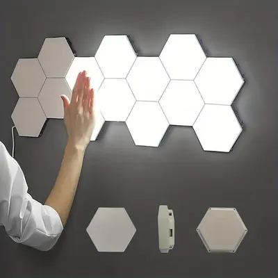 Demonstrates the interactive touch-activated functionality and modular hexagonal design of the lighting panels in a real-world wall setting to help shoppers visualize installation and use.