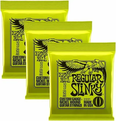 Shows the product packaging clearly to help shoppers identify the Ernie Ball Regular Slinky guitar strings and communicate that multiple packs are included in the purchase.