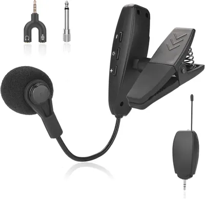 Shows all included components and accessories to communicate the complete package the buyer will receive, including the main microphone unit, clip attachment, earpiece, adapters, and receiver.