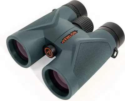 Displays the core product clearly to show shoppers what they will receive, highlighting the design, branding, and build quality of the binoculars. Uses a subtle drop shadow to ground the product and…