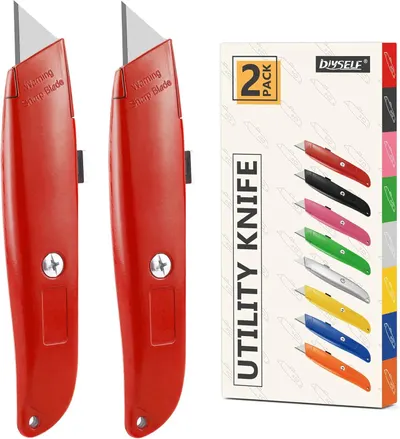 Displays the core sellable product—two red utility knives with retractable blades—clearly and prominently to show the shopper exactly what they will receive. Shows the retail packaging box alongside…