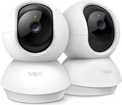 Shows two identical security cameras to communicate that this is a multi-pack purchase, allowing shoppers to see the product design and understand they are buying multiple units.