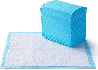 Shows the core product as a large stack of disposable absorbent pads to communicate quantity value and demonstrate the quilted texture and construction of the pads.