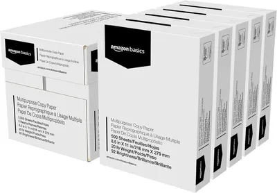 Shows the core product—multiple reams of Amazon Basics multipurpose copy paper—clearly displayed in their retail packaging to communicate quantity and brand. Displays the physical retail packaging…