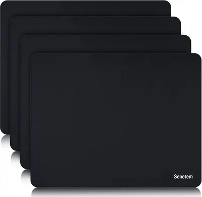 Shows the core product as a set of four identical black mouse pads, clearly displaying the quantity included in the purchase. Uses drop shadows and reflections beneath the stacked mouse pads to…